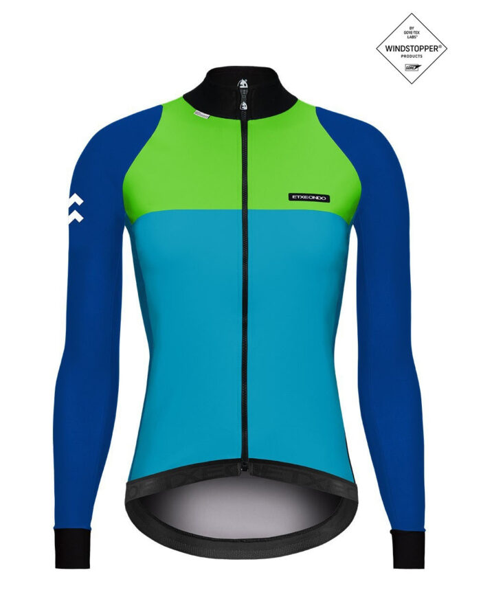 76-fem-ver-1 ETXEONDO Chaqueta Mujer 76 Gore-Tex Windstopper verde / azul - Imagen 1